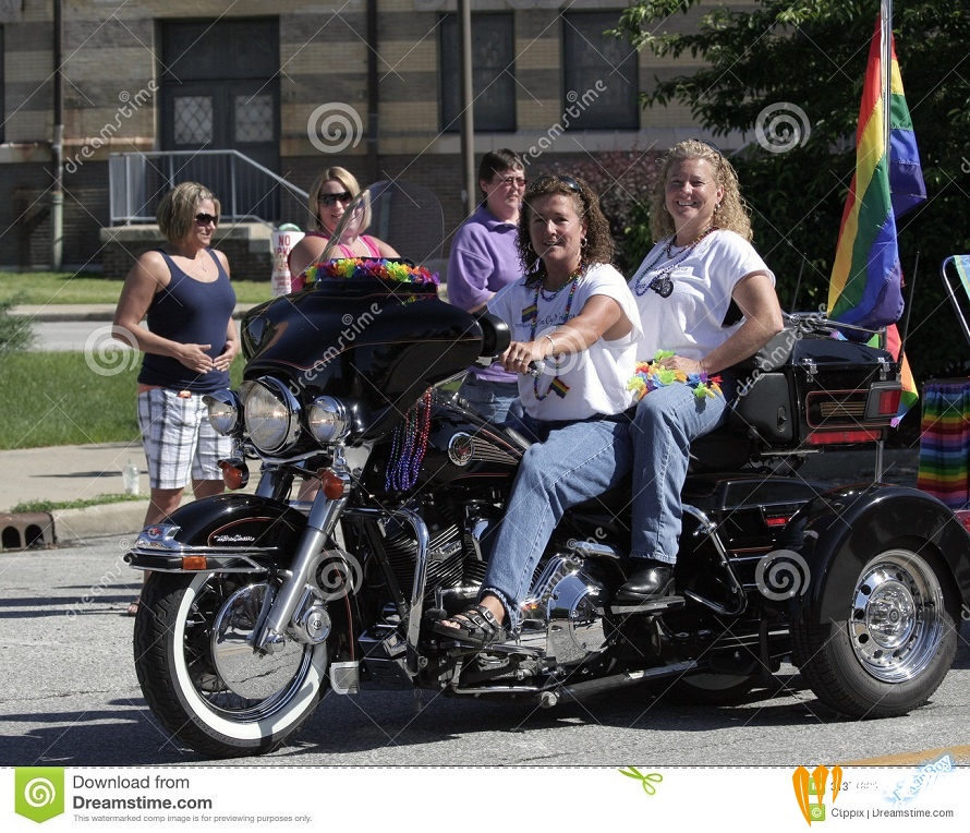 female-motorcycle-riders-rainbow-flag-indy-pride-parade-indianapolis-indiana-31371885.jpg